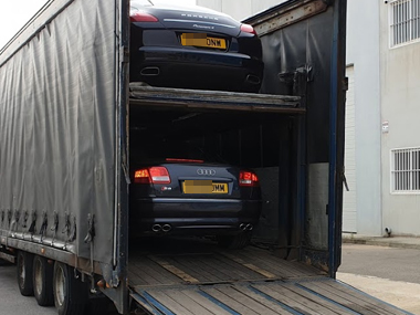 Porsche Panamera 4 Coupe and Audi S8 arrive on covered transporter from UK Porsche and Audi on transporter